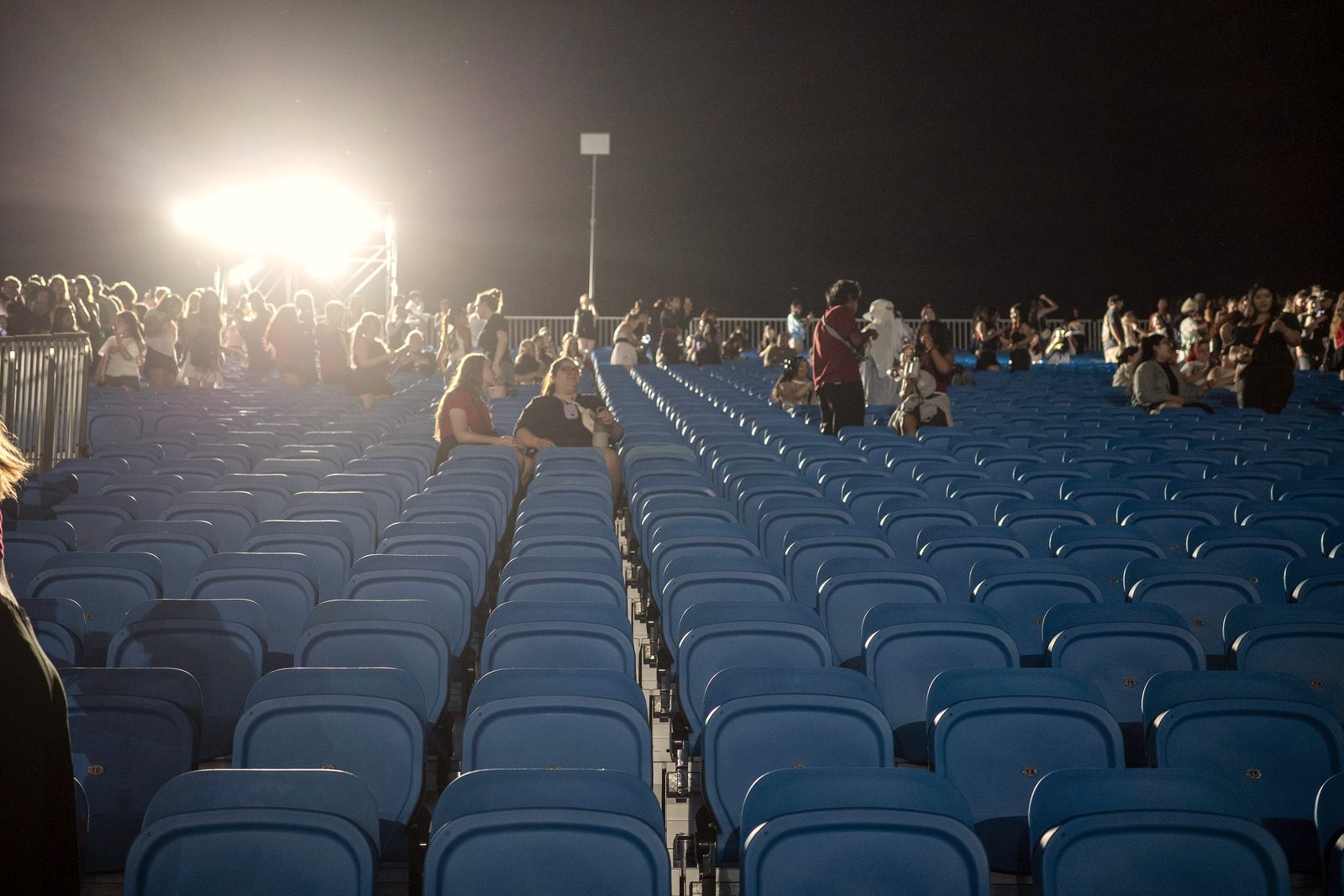 Tiered seating in an empty stadium bowl